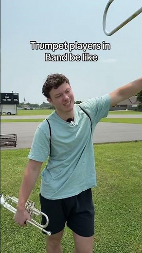 Trumpet players in band