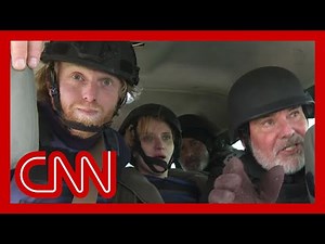 CNN crew has close call with artillery fire