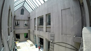Many patients seeking medical attention queue patiently waiting at government hospital atrium lobby