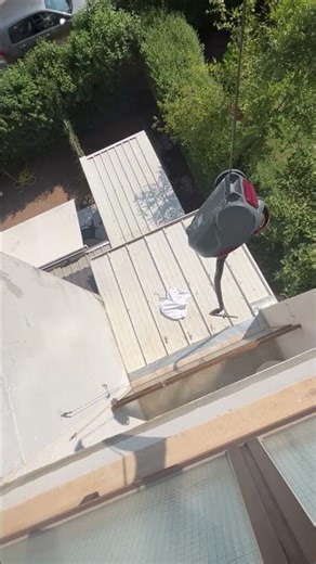 Vacuum Cleaner Attempts to Retrieve Shirt from Roof
