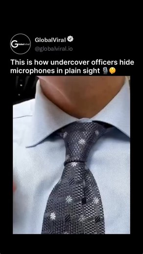 GlobalViral on Instagram: "This video demonstrates a clever and discreet way to conceal a miniature spy camera within a necktie. The process begins with the person inserting a small, wired camera lens through the fabric of the tie, positioning it right at the center of the knot. To ensure the camera remains hidden and secure, a matching piece of fabric—likely cut from the same tie or a similar material—is used to cover the lens. The video shows the meticulous steps taken to blend the device into