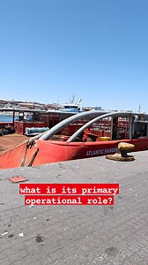 Based on this vessel's structural configuration—hull design, deck layout, freeboard, and equipment arrangement—what is its primary operational role? Choose the correct answer 🤔 A) Fuel oil bunkering vessel - optimized for liquid cargo transfer with tank capacity prioritized over deck space B) Anchor Handling Tug Supply (AHTS) - designed for offshore anchor handling with stern roller, large clear deck, and high bollard pull C) Ocean-going tug - built for long-distance towing with enhanced seakee