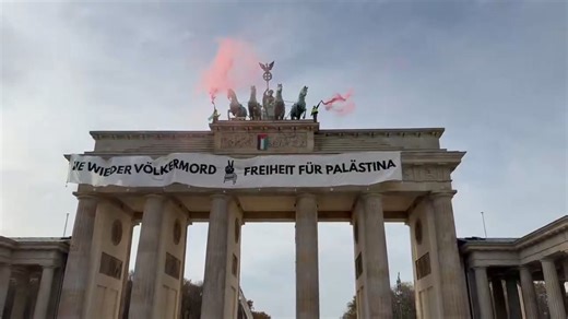 Pro-Palestinian activists protest at Brandenburg Gate in Berlin, Germany