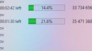 clip-1081942583-file-download-indicator-on-computer-screen
