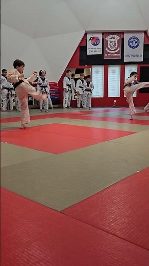 Angela and Nicholas' - Black Belt 3d Star Tip Test - Kicking Warm Up