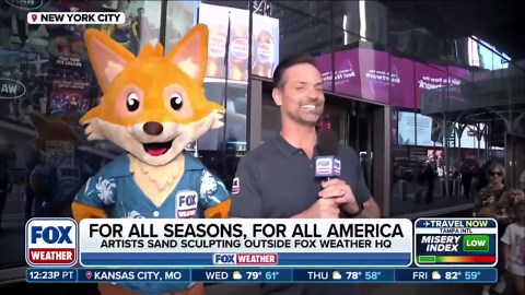 Nick Kosir and Sonny stroll through Times Square