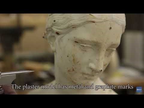 John Sonnier demonstrates using a pointing machine for the Smithsonian American Art Museum