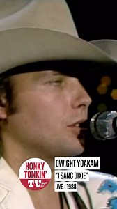 I Sang Dixie is one of Dwight Yoakam’s most powerful songs, released in 1988 as the second single from his album Buenas Noches from a Lonely Room. Written by Yoakam himself, the song tells the story of a man witnessing a dying drifter in Los Angeles, longing for the South he left behind. With its mournful steel guitar and Yoakam’s signature Bakersfield-meets-traditional-country twang, it became his second No. 1 hit on the Billboard Hot Country Songs chart. The song’s lonesome storytelling and so