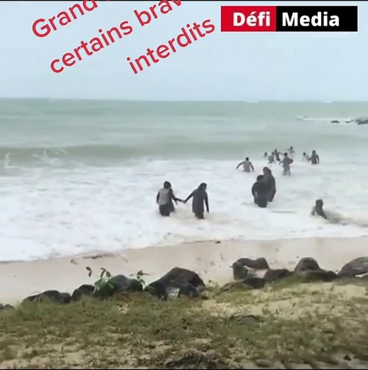 Communal Beach Rituals in Grand Baie, Mauritius