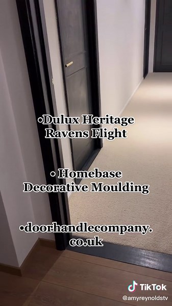 How we transformed our flat panel doors into luxurious statements without replacing them and on a modest budget… #homerenovation #homedecor #flatpaneldoors #ukdecor #diy #homedecorideas #diyideas #homeimprovement #levelup #duluxheritage #transformation #diytransformation #blackdoor #blackdoors #goldhandles #panelling #decorativetrims