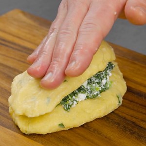 What's your favorite way to stuff these cheesy mashed potato bombs? 🥔🧀💥 📌 RECIPE: www.scrumdiddlyumptious.com/4-stuffed-potato-bombs | Scrumdiddlyumptious