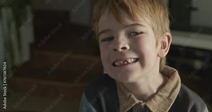 Kid Boy Shows Lost Baby Tooth. Child Hold in Hand Fallen Out Milk Teeth. 4K Slow motion 10-bit