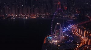 Aerial night view of the biggest ferris wheel in the world - Ain Dubai