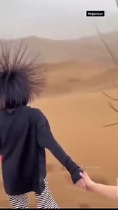 3.8K views · 77 reactions | Gobi Desert, Mongolia A group of tourist was wandering through the desert and their hair suddenly became electrified. This means that a lightning strikes is imminent. If your hair stands on end, lightning is about to strike you. Take cover quickly as you can or drop to your knees and bend forward but don't lie flat on the ground. Weather Updates PK 2.0 - Jawad Memon / Pakistan Doppler (Former Karachi Doppler) | Weather Updates PK 2.0 - Jawad Memon | Facebook