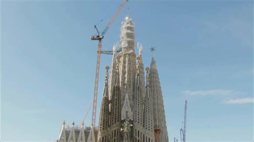Milestone: Arm of cross placed atop Barcelona's Sagrada Familia making it reach its maximum height