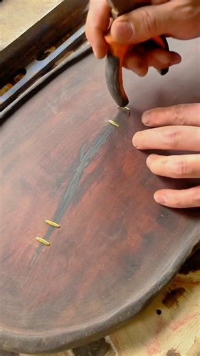 Carefully Repairing a Cracked Wooden Board Using Small Metal Staples and Hand Tools #shorts