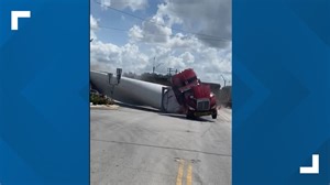VIDEO: Train crashes into semi-truck with wind turbine blade attached