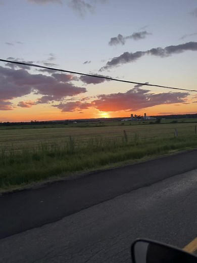 Sun setting over a farm. . . #maritimer #fyp #fypage #newbrunswick #canada #sunset #zachbryan #farm #clouds #motorcycle #africatwin #honda