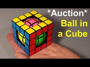 Tony Fisher's Ball in a Cube Puzzle (past auction)