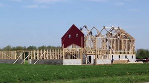 Timelapse shows day-long, old fashioned barn raising