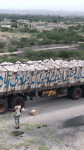 Truck Driver, unsuccessfully trying to get tis truck over the bridge, tries hard to get the truck over the bridge but fails, | Bus Of Balochistan