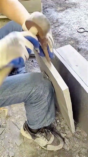 manual cutting of marble tiles using a hammer and iron chisel to make the tiles look neater cleaner