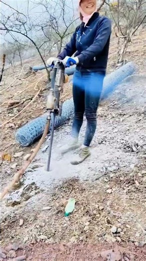 Woman Uses Handheld Air Drill for Boring, Busy Mountain Construction!