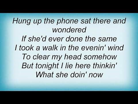 Garth Brooks - What She's Doing Now Lyrics