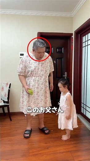 Dad teaches daughter how to dress