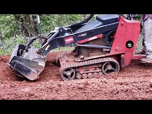 Dingo diesel with rototiller attachment micro gardening