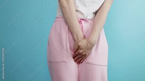 Urinary incontinence, woman holding crotch, painful bladder, urgent urination, disease.