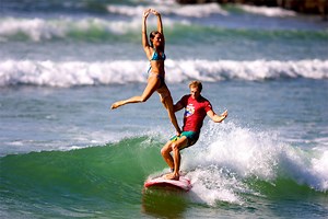 What is tandem surfing?