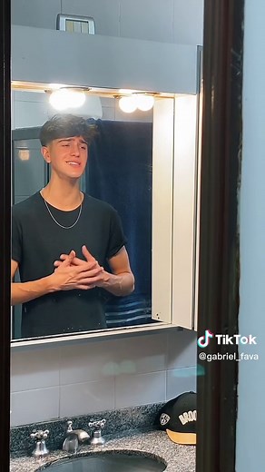 Mirror Reflection Hand Gestures in Bathroom Setting