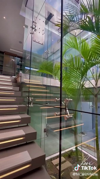 “An atrium is a space in a building, enclosed by walls or glass that functions as a light well that is open to the sky. This feature space is usually decorated with plants or water features that can allow natural light and ventilation into the building.” For more amazing architectural content subscribe to our YouTube Channel. (Link in bio) #fmarchitectsinternational #fmarchitects #architecturetiktok #architecturetok #fyp #foryoupage #tiktoksouthafrica #trending #viral #luxuryhomesjohannesburg