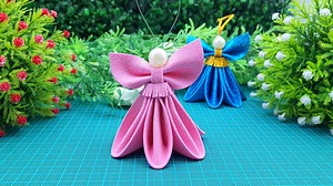 8.3K views · 342 reactions | Diy Christmas Decorations With Glitter Foam Paper Angels | How To Make A Angel For Christmas Tree Ornaments. It's very easy and simple glitter foam sheet angel- Christmas angel making tutorial- Decorations for christmas events 2022. #ChristmasAngel #ChristmasEvents #Angel | Entertaining Arts | Facebook