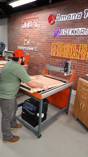 Can your machine do this? Swapping out the tables on the Stepcraft M.1000 CNC machine to cut into the edge of a board using the Amana Tool 46448-K 1/16