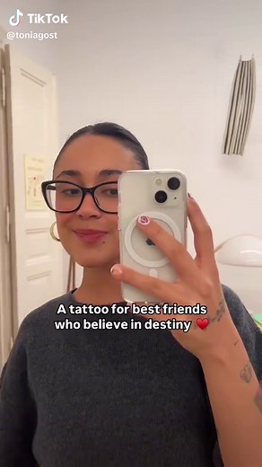 Explore the Meaning Behind the Red String Theory Tattoo