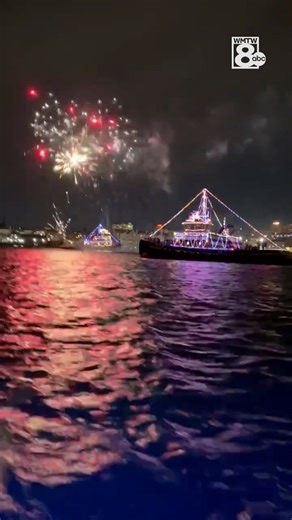 Fireworks during Christmas boat parade in Portland, Maine
