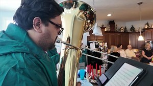 Indy Big Band Christmas caroling musicians spread holiday cheer to those in need