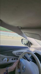 ROAD BUILT BETWEEN SEE & MOUNTAINS