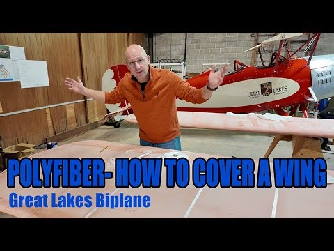 Fabric work continues on the Great Lakes Biplane