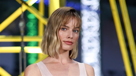 Margot Robbie debuts bold new hair cut at Paris Fashion Week
