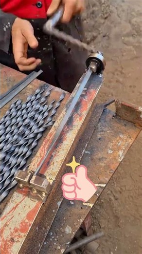 Forming process of spiral steel sheets