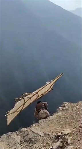 Men Attempt Flying from Mountain: Shocking Fail! #fly #fail #motivation #viral #trending #ai