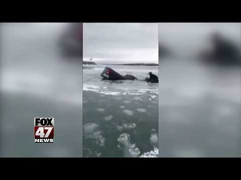 Michigan man rescued after his truck falls through the ice