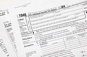 How to Deduct Workers' Compensation From Federal Tax Form 1040