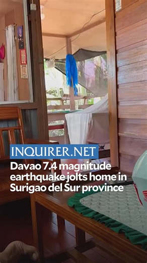 A home shook as a magnitude 7.4 magnitude earthquake jolts the Davao Oriental on Friday, October 10. Footage shows appliances rattling, sparking panic among residents in Surigao del Sur province. A mother was seen steadying the family's refrigerator while her son turned off the electricity as the quake rocked their wooden home. | INQUIRER.net