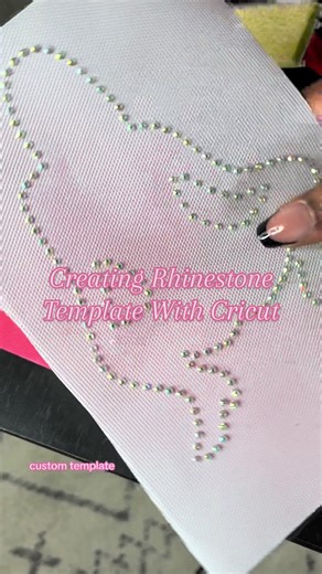Did you know that you can use Cricut to design and create your own rhinestone templates? #rhinestonetemplate #rhinestone #rhinestonesmallbusiness #rhinestoneapparel #rhinestonedesign #rhinestonetemplatematerial #rhinestonetemplates #cricutrhinestoneprojects
