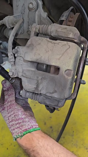 Malibu front brake service install new brake pads #automobile #mechanic