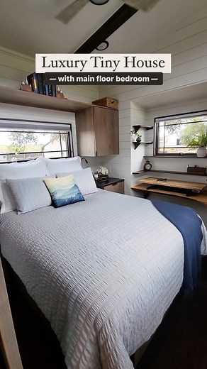 MitchCraft Tiny Homes | And that’s not all… this 30x10’ 2 bedroom custom tiny home also features stone countertops, tile shower, round window, electric fireplace... | Instagram